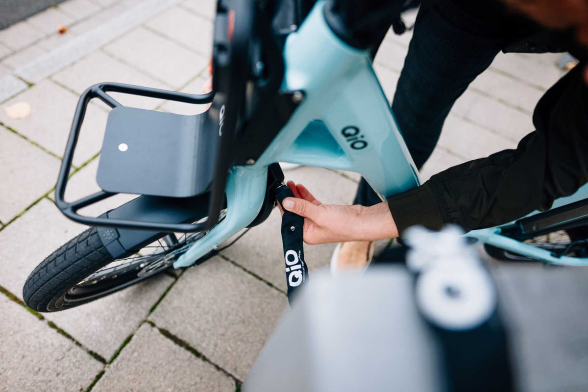 qio fahrradschloss Qio Schlossset Trelock RS 480 + Einsteckkette 100cm + Akkuschliesszyli – Biketech24